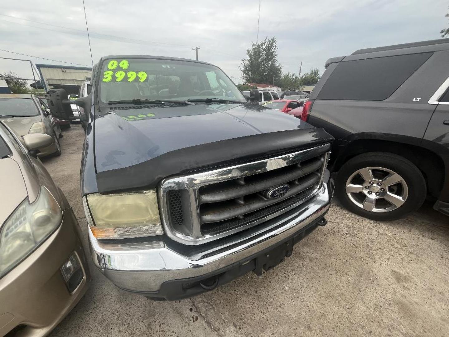 2004 BLUE FORD F-250 SD XL Crew Cab 2WD (1FTNW20P54E) with an 6.0L V8 OHV 32V TURBO DIESEL engine, AUTOMATIC transmission, located at 2303 West Mt. Houston, Houston, Texas, 77038, (281) 507-3956, 29.771597, -95.339569 - Photo#9