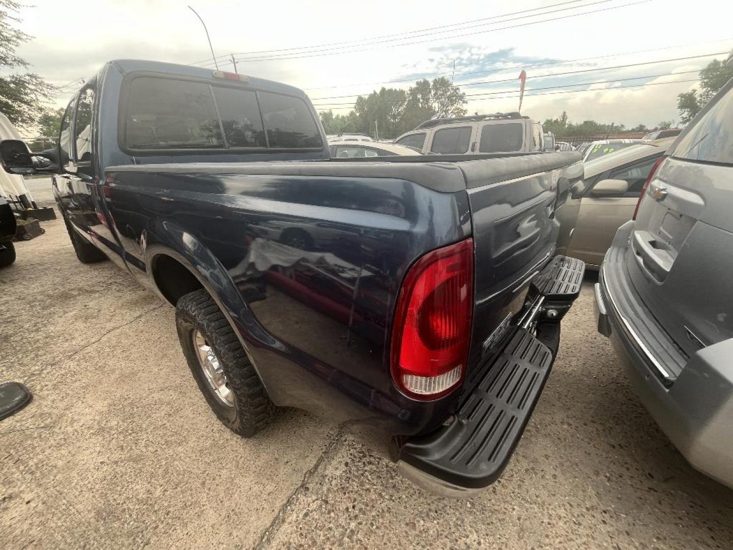 2004 BLUE FORD F-250 SD XL Crew Cab 2WD (1FTNW20P54E) with an 6.0L V8 OHV 32V TURBO DIESEL engine, AUTOMATIC transmission, located at 2303 West Mt. Houston, Houston, Texas, 77038, (281) 507-3956, 29.771597, -95.339569 - Photo#3