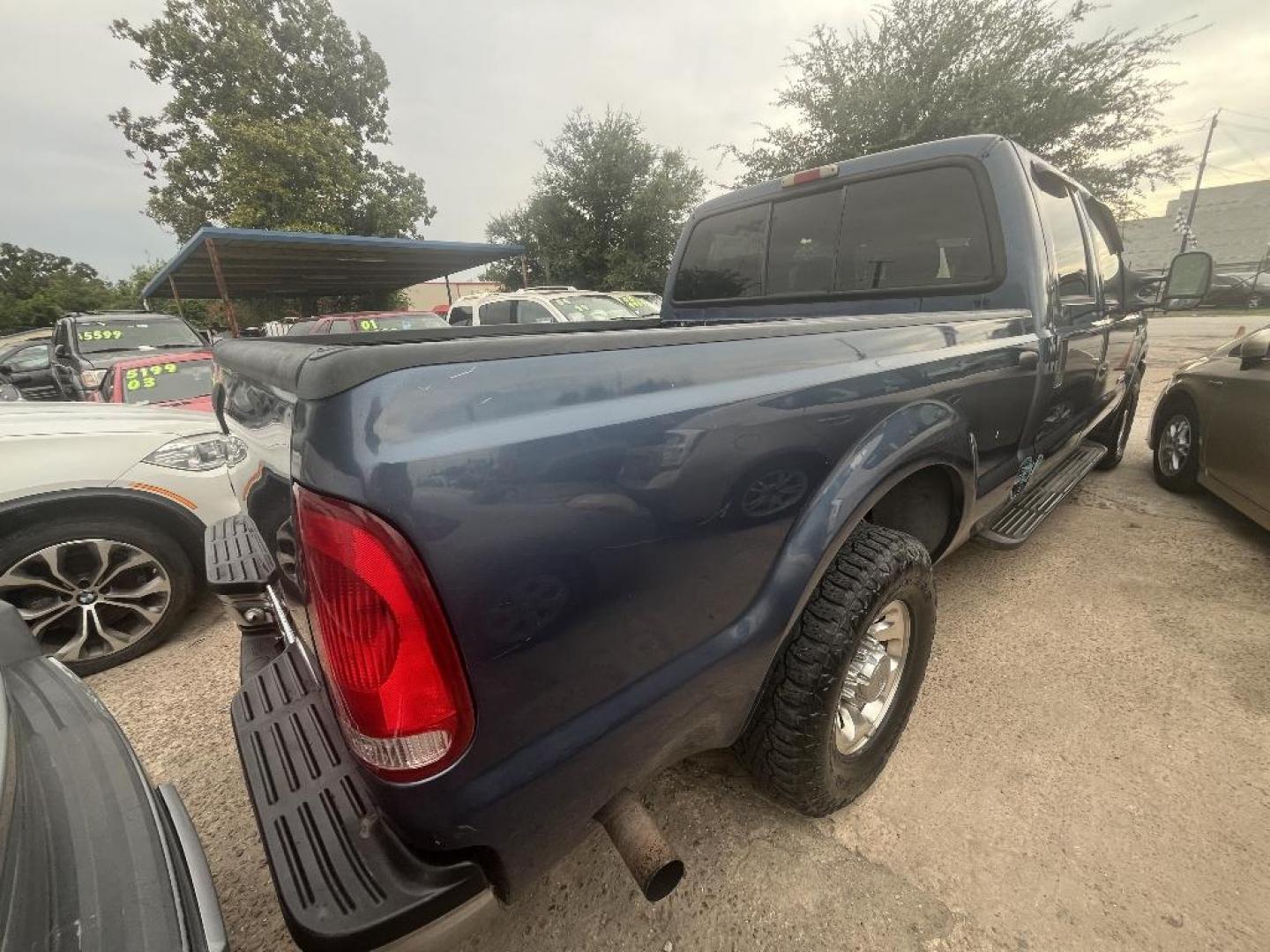 2004 BLUE FORD F-250 SD XL Crew Cab 2WD (1FTNW20P54E) with an 6.0L V8 OHV 32V TURBO DIESEL engine, AUTOMATIC transmission, located at 2303 West Mt. Houston, Houston, Texas, 77038, (281) 507-3956, 29.771597, -95.339569 - Photo#6