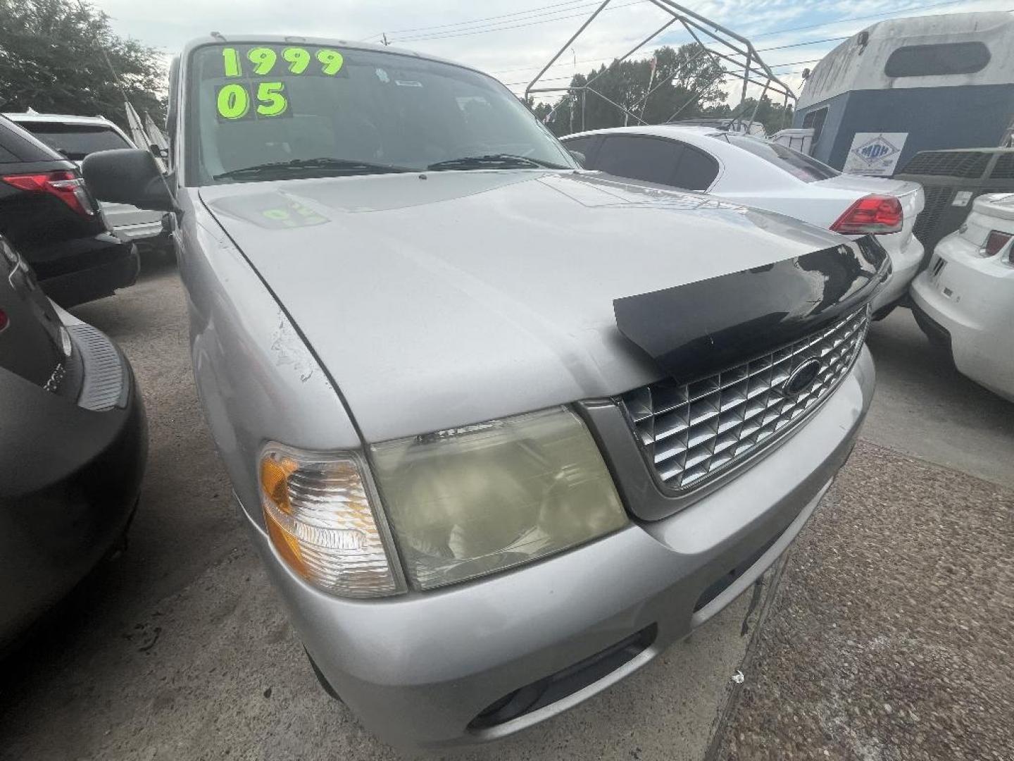 2005 BROWN FORD EXPLORER XLT 4.0L 4WD (1FMZU73K95U) with an 4.0L V6 SOHC 12V FFV engine, AUTOMATIC transmission, located at 2303 West Mt. Houston, Houston, Texas, 77038, (281) 507-3956, 29.771597, -95.339569 - Photo#1