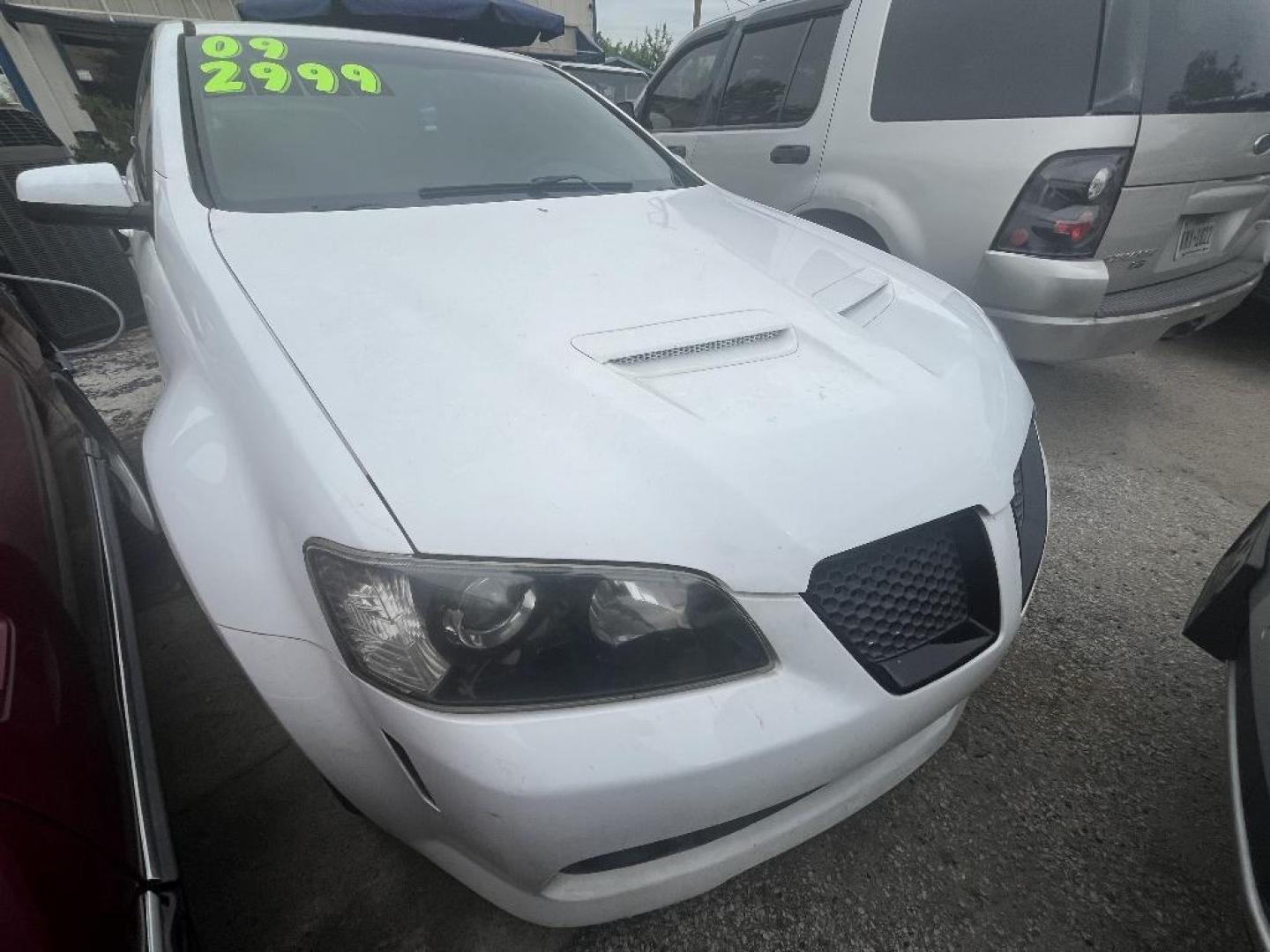 2009 WHITE PONTIAC G8 Base (6G2ER57709L) with an 3.6L V6 DOHC 24V engine, AUTOMATIC transmission, located at 2303 West Mt. Houston, Houston, Texas, 77038, (281) 507-3956, 29.771597, -95.339569 - Photo#0