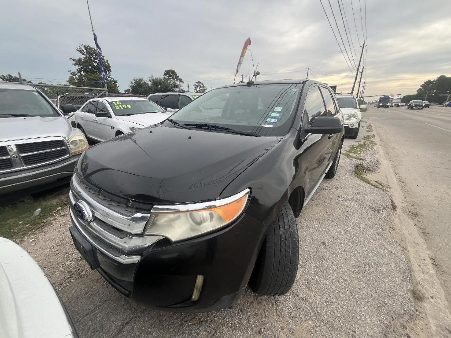 2011 BLACK FORD EDGE Limited FWD (2FMDK3KC1BB) with an 3.5L V6 DOHC 24V engine, AUTOMATIC transmission, located at 2303 West Mt. Houston, Houston, Texas, 77038, (281) 507-3956, 29.771597, -95.339569 - Photo#0