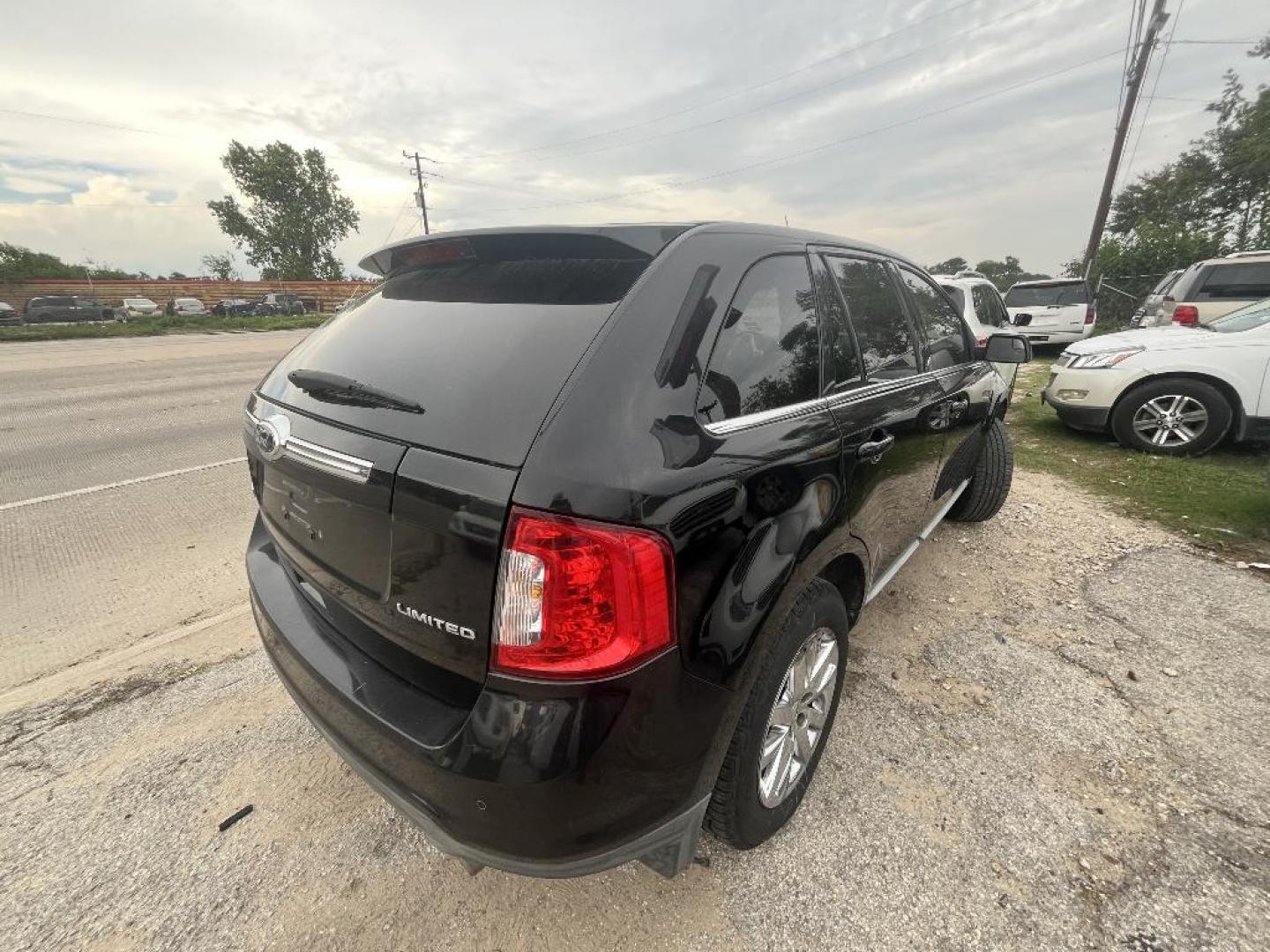 2011 BLACK FORD EDGE Limited FWD (2FMDK3KC1BB) with an 3.5L V6 DOHC 24V engine, AUTOMATIC transmission, located at 2303 West Mt. Houston, Houston, Texas, 77038, (281) 507-3956, 29.771597, -95.339569 - Photo#5