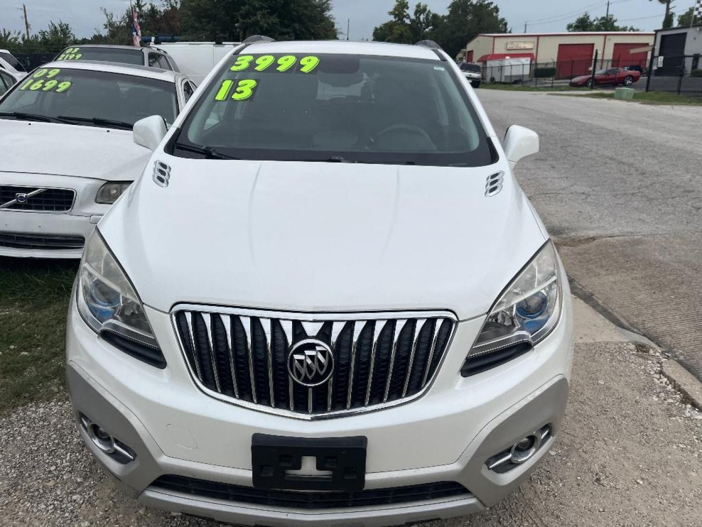 2013 WHITE BUICK ENCORE Convenience FWD (KL4CJBSB0DB) with an 1.4L L4 DOHC 16V TURBO engine, AUTOMATIC transmission, located at 2303 West Mt. Houston, Houston, Texas, 77038, (281) 507-3956, 29.771597, -95.339569 - Photo#1