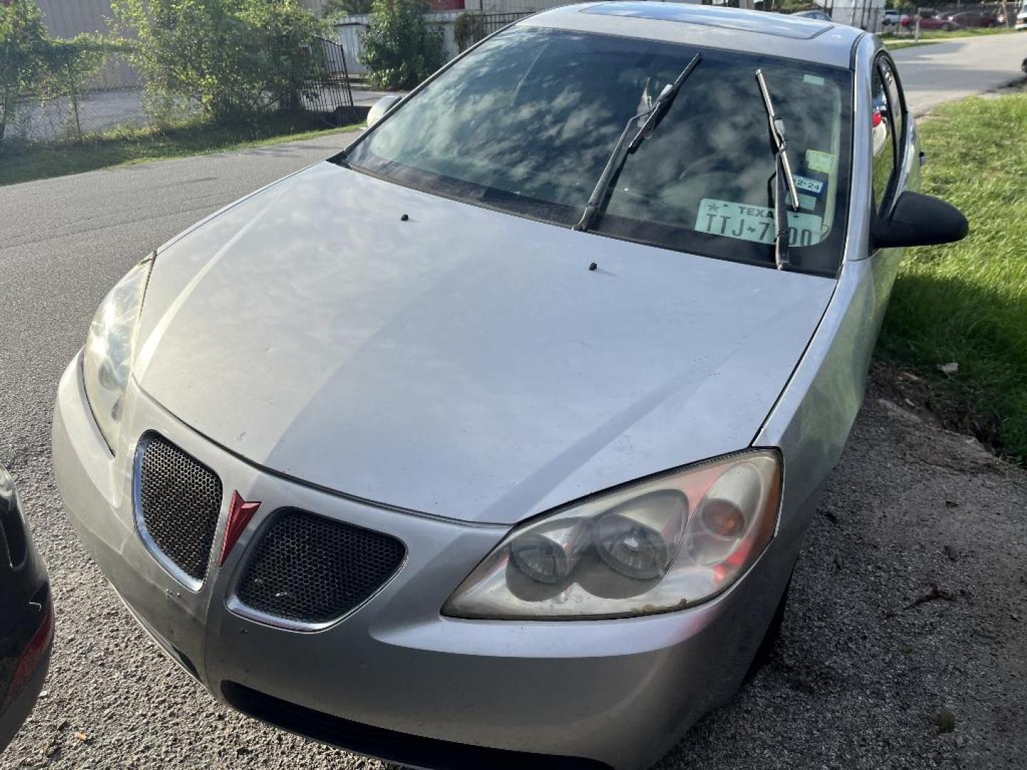 2005 GRAY PONTIAC G6 Base (1G2ZG528054) with an 3.5L V6 OHV 12V engine, AUTOMATIC transmission, located at 2303 West Mt. Houston, Houston, Texas, 77038, (281) 507-3956, 29.771597, -95.339569 - Photo#0