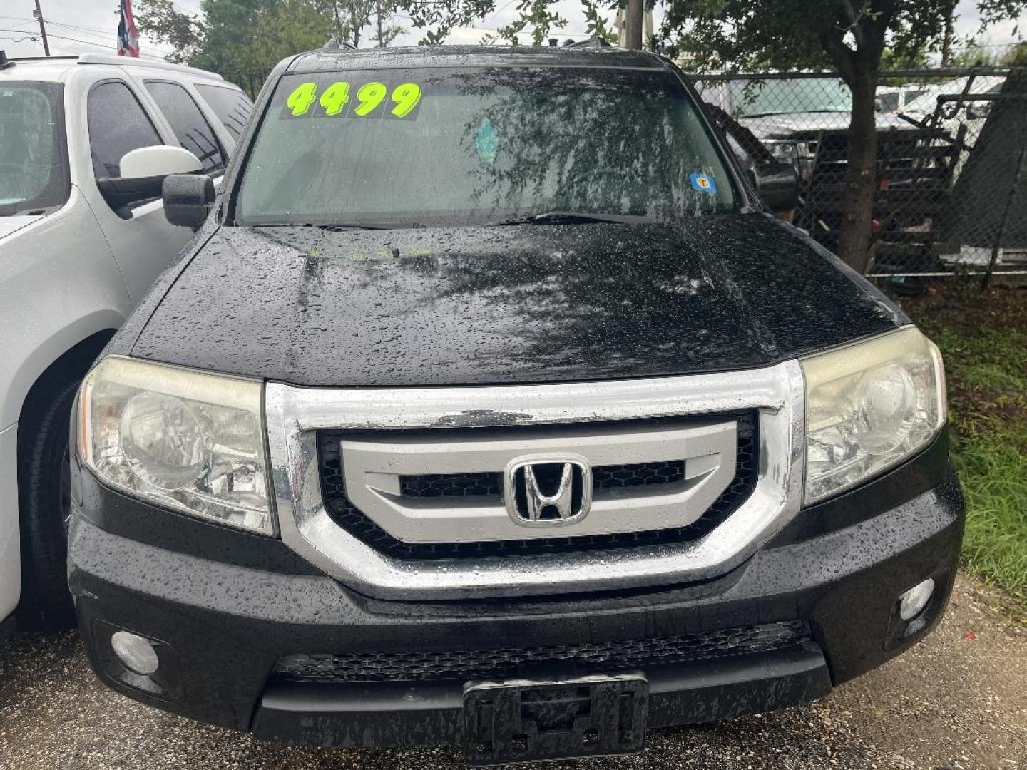 2011 BLACK HONDA PILOT EX-L 2WD 5-Spd AT (5FNYF3H56BB) with an 3.5L V6 SOHC 24V engine, AUTOMATIC transmission, located at 2303 West Mt. Houston, Houston, Texas, 77038, (281) 507-3956, 29.771597, -95.339569 - Photo#4