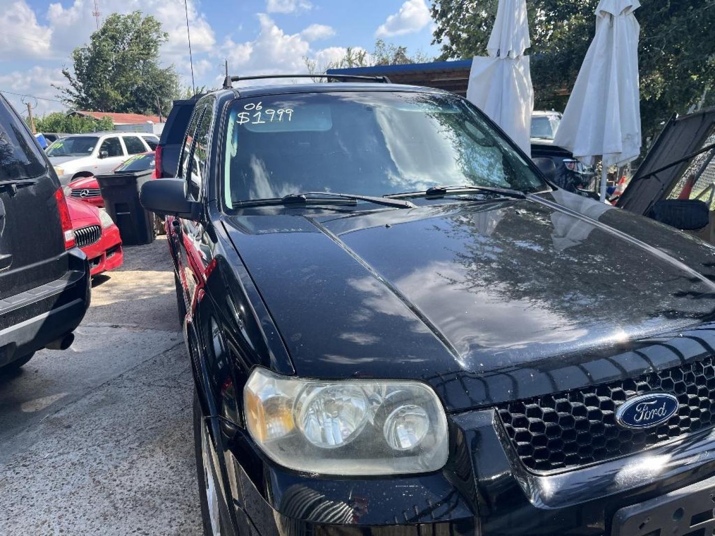 2006 BLACK FORD ESCAPE Limited 2WD (1FMYU04146K) with an 3.0L V6 DOHC 24V engine, AUTOMATIC transmission, located at 2303 West Mt. Houston, Houston, Texas, 77038, (281) 507-3956, 29.771597, -95.339569 - Photo#1