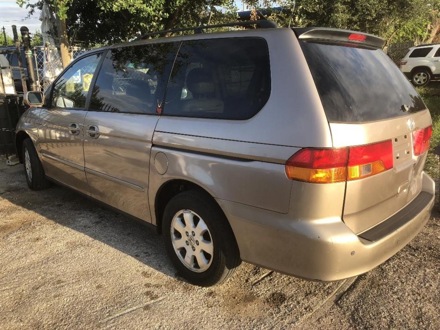 2004 BROWN HONDA ODYSSEY EX w/ Leather and DVD (5FNRL18094B) with an 3.5L V6 SOHC 24V engine, AUTOMATIC transmission, located at 2303 West Mt. Houston, Houston, Texas, 77038, (281) 507-3956, 29.771597, -95.339569 - Photo#0