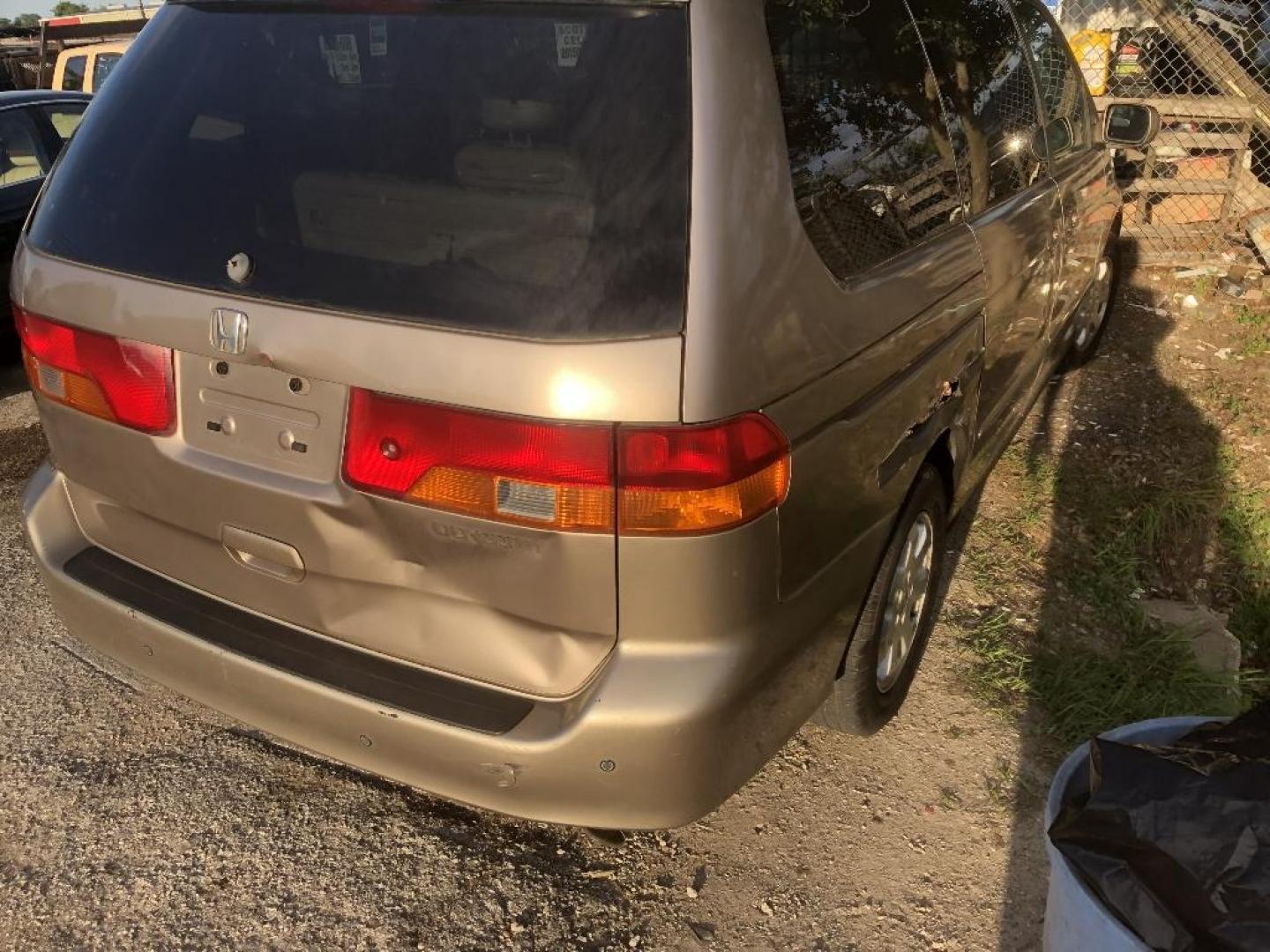 2004 BROWN HONDA ODYSSEY EX w/ Leather and DVD (5FNRL18094B) with an 3.5L V6 SOHC 24V engine, AUTOMATIC transmission, located at 2303 West Mt. Houston, Houston, Texas, 77038, (281) 507-3956, 29.771597, -95.339569 - Photo#2