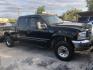 1999 BLACK FORD F-250 SD XLT Crew Cab SWB 4WD (1FTNW21S1XE) with an 6.8L V10 SOHC 20V engine, AUTOMATIC transmission, located at 2303 West Mt. Houston, Houston, Texas, 77038, (281) 507-3956, 29.771597, -95.339569 - Photo#1