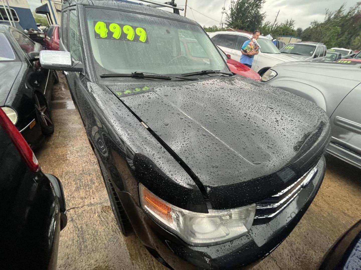 2010 BLACK FORD FLEX Limited AWD (2FMHK6DT4AB) with an 3.5L V6 DOHC 24V engine, AUTOMATIC transmission, located at 2303 West Mt. Houston, Houston, Texas, 77038, (281) 507-3956, 29.771597, -95.339569 - Photo#0