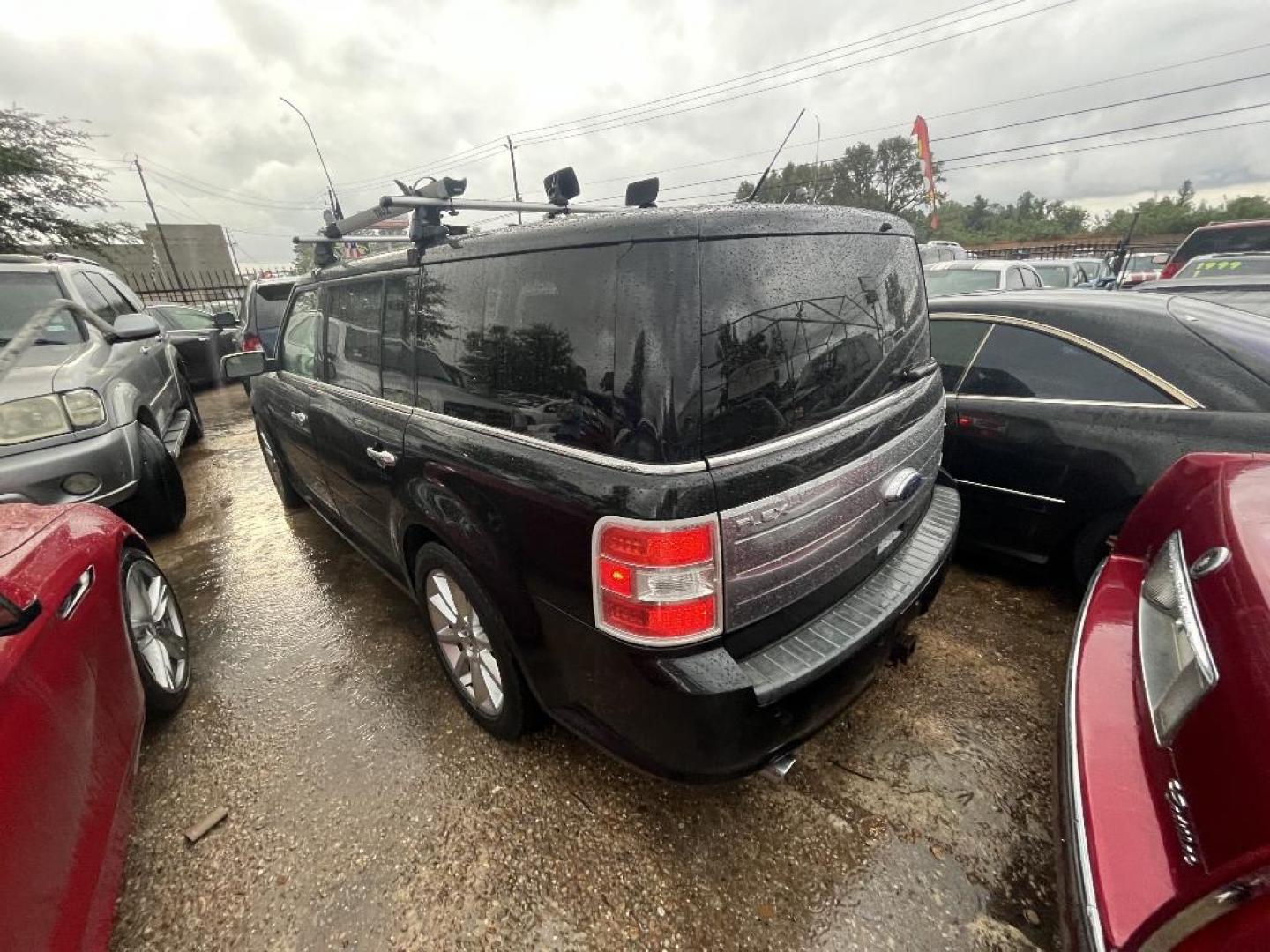 2010 BLACK FORD FLEX Limited AWD (2FMHK6DT4AB) with an 3.5L V6 DOHC 24V engine, AUTOMATIC transmission, located at 2303 West Mt. Houston, Houston, Texas, 77038, (281) 507-3956, 29.771597, -95.339569 - Photo#3