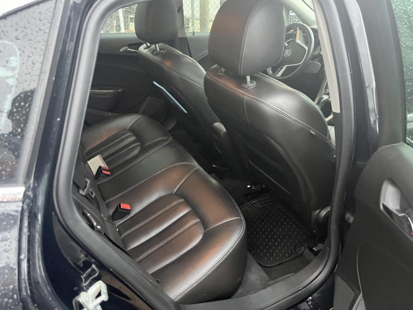 2013 BLACK BUICK VERANO Leather (1G4PS5SK3D4) with an 2.4L L4 DOHC 16V FFV engine, AUTOMATIC transmission, located at 2303 West Mt. Houston, Houston, Texas, 77038, (281) 507-3956, 29.771597, -95.339569 - Photo#3