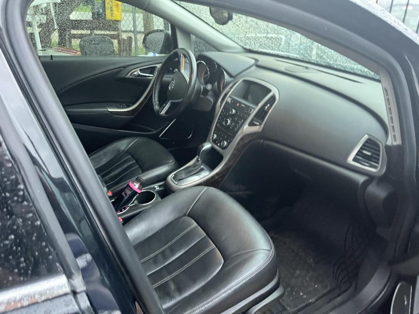 2013 BLACK BUICK VERANO Leather (1G4PS5SK3D4) with an 2.4L L4 DOHC 16V FFV engine, AUTOMATIC transmission, located at 2303 West Mt. Houston, Houston, Texas, 77038, (281) 507-3956, 29.771597, -95.339569 - Photo#4