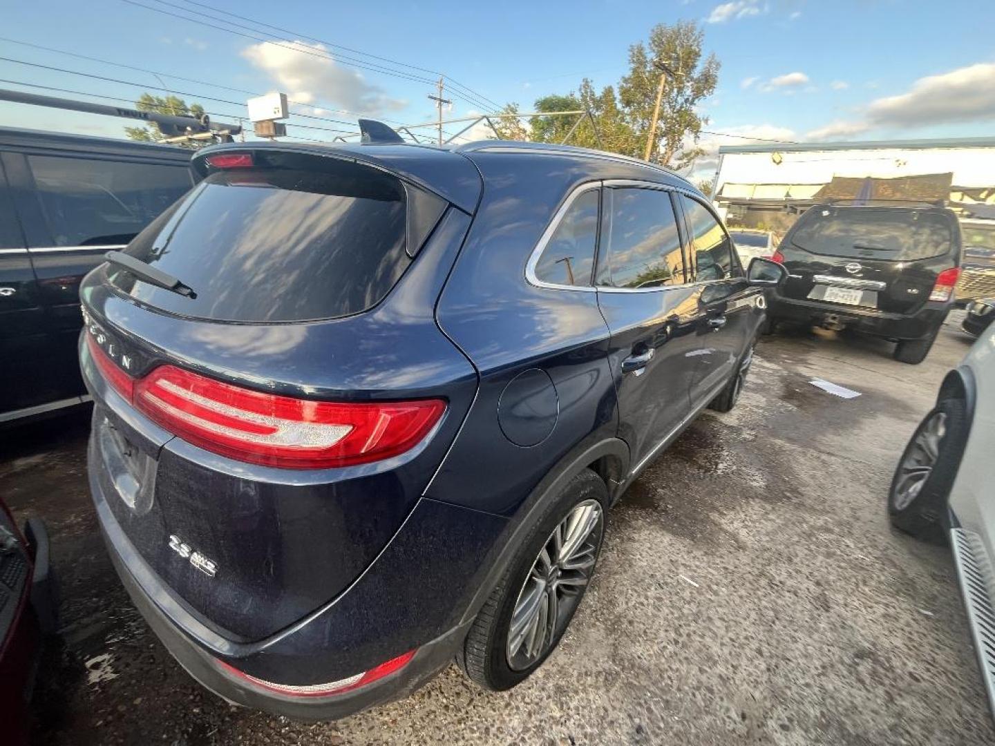 2015 BLACK LINCOLN MKC AWD (5LMTJ2AH9FU) with an 2.3L L4 DOHC 16V engine, AUTOMATIC transmission, located at 2303 West Mt. Houston, Houston, Texas, 77038, (281) 507-3956, 29.771597, -95.339569 - Photo#1