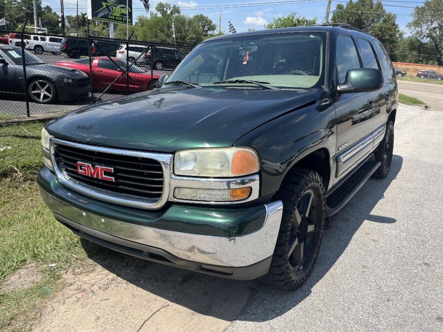 2004 GREEN GMC YUKON 2WD (1GKEC13Z24R) with an 5.3L V8 OHV 16V FFV engine, AUTOMATIC transmission, located at 2303 West Mt. Houston, Houston, Texas, 77038, (281) 507-3956, 29.771597, -95.339569 - Photo#0