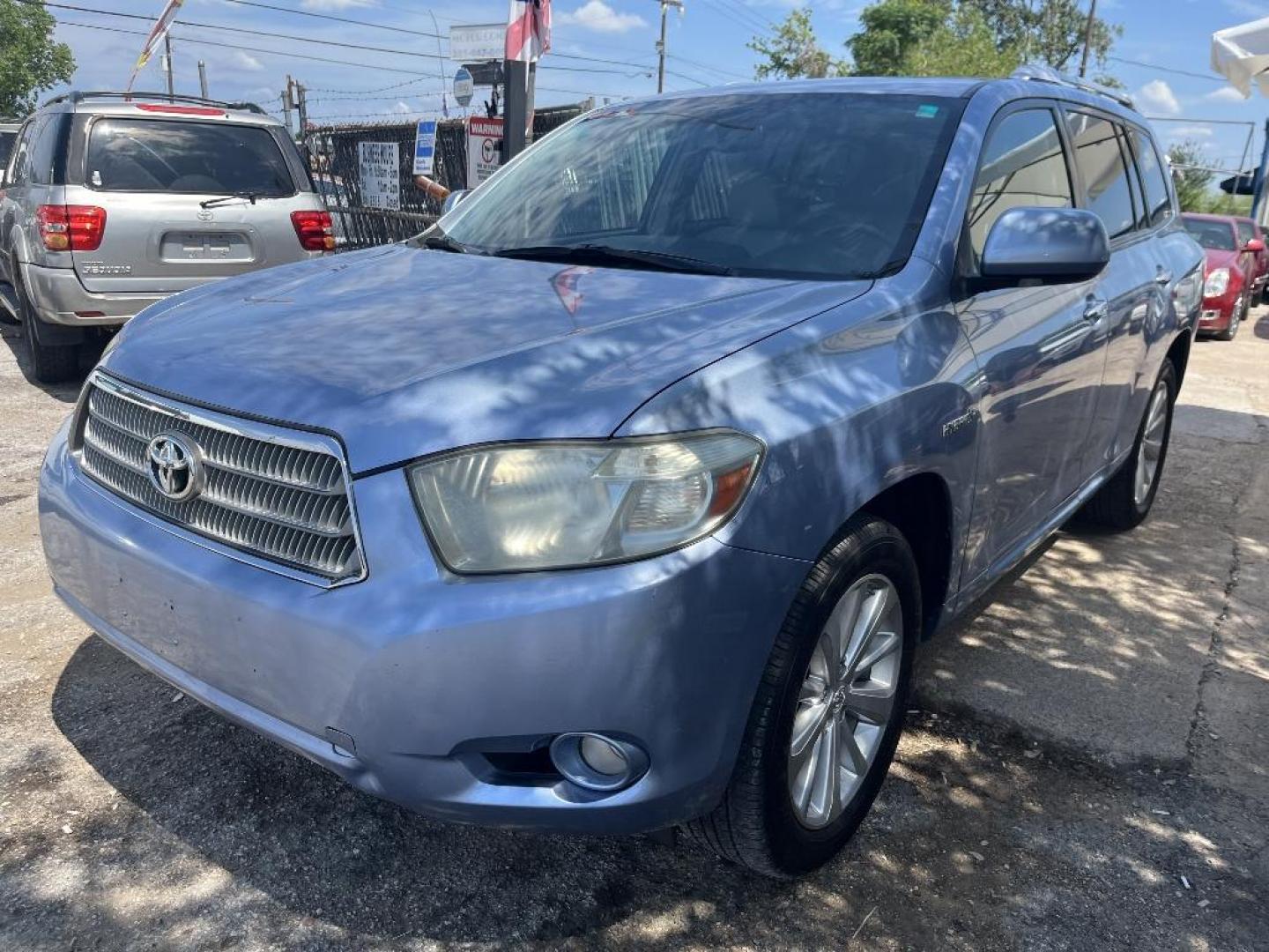 2010 WHITE TOYOTA HIGHLANDER HYBRID Limited 4WD (JTEJW3EHXA2) with an 3.3L V6 DOHC 24V HYBRID engine, AUTOMATIC transmission, located at 2303 West Mt. Houston, Houston, Texas, 77038, (281) 507-3956, 29.771597, -95.339569 - Photo#0