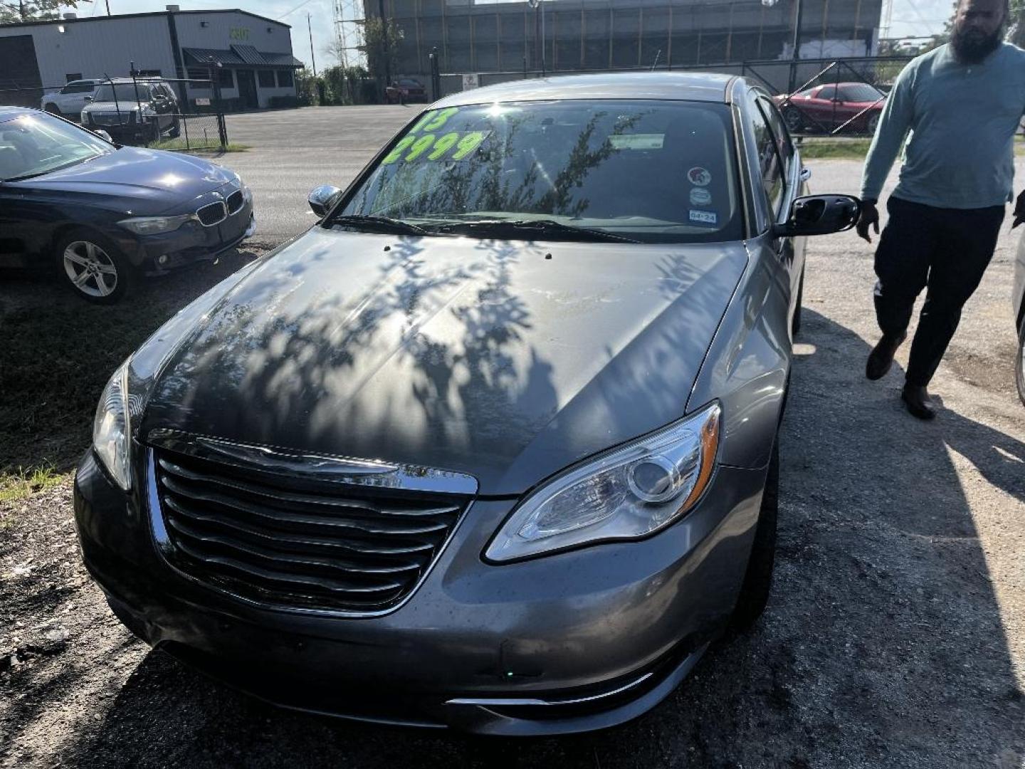 2013 GRAY CHRYSLER 200 Limited (1C3CCBCG7DN) with an 3.6L V6 DOHC 24V FFV engine, AUTOMATIC transmission, located at 2303 West Mt. Houston, Houston, Texas, 77038, (281) 507-3956, 29.771597, -95.339569 - Photo#0