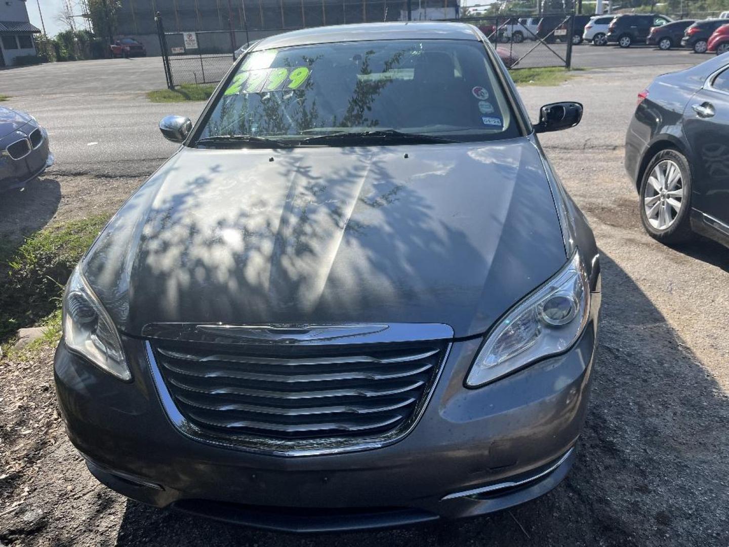 2013 GRAY CHRYSLER 200 Limited (1C3CCBCG7DN) with an 3.6L V6 DOHC 24V FFV engine, AUTOMATIC transmission, located at 2303 West Mt. Houston, Houston, Texas, 77038, (281) 507-3956, 29.771597, -95.339569 - Photo#1