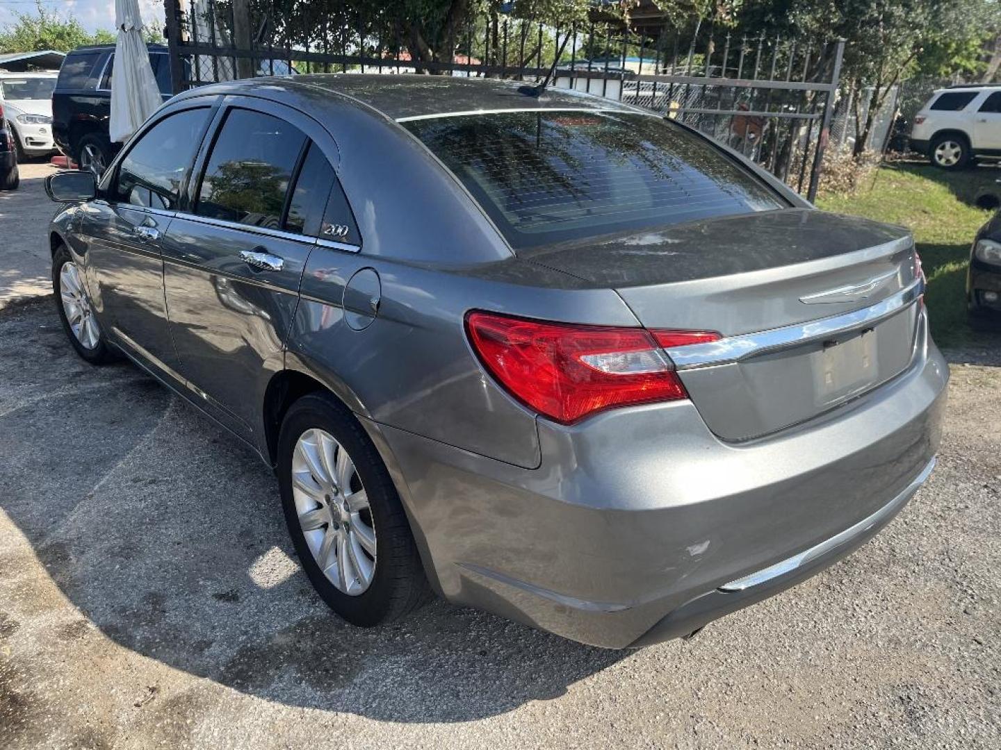 2013 GRAY CHRYSLER 200 Limited (1C3CCBCG7DN) with an 3.6L V6 DOHC 24V FFV engine, AUTOMATIC transmission, located at 2303 West Mt. Houston, Houston, Texas, 77038, (281) 507-3956, 29.771597, -95.339569 - Photo#2