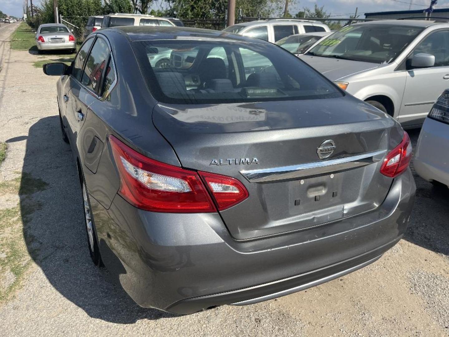 2016 GRAY NISSAN ALTIMA 2.5 S (1N4AL3AP9GC) with an 2.5L L4 DOHC 16V engine, AUTOMATIC transmission, located at 2303 West Mt. Houston, Houston, Texas, 77038, (281) 507-3956, 29.771597, -95.339569 - Photo#2