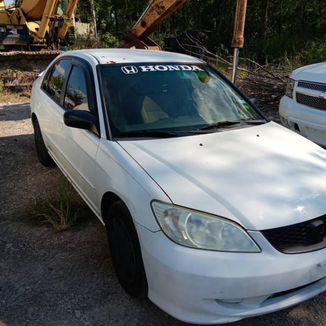 2005 WHITE HONDA CIVIC LX sedan AT (2HGES16595H) with an 1.7L L4 SOHC 16V engine, AUTOMATIC transmission, located at 2303 West Mt. Houston, Houston, Texas, 77038, (281) 507-3956, 29.771597, -95.339569 - Photo#0