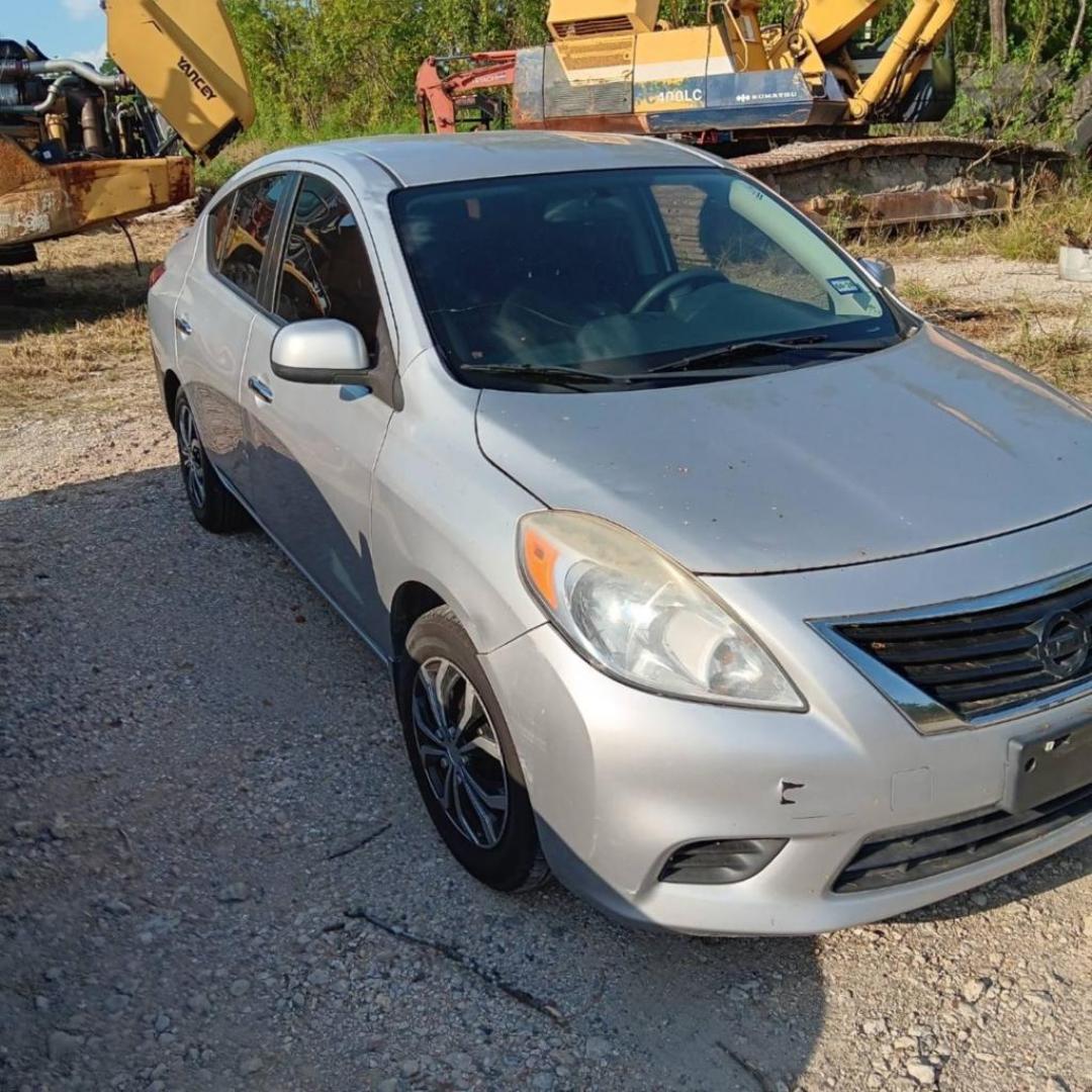 2013 GRAY NISSAN VERSA 1.6 S 5M (3N1CN7APXDL) with an 1.6L L4 DOHC 16V engine, AUTOMATIC transmission, located at 2303 West Mt. Houston, Houston, Texas, 77038, (281) 507-3956, 29.771597, -95.339569 - Photo#0