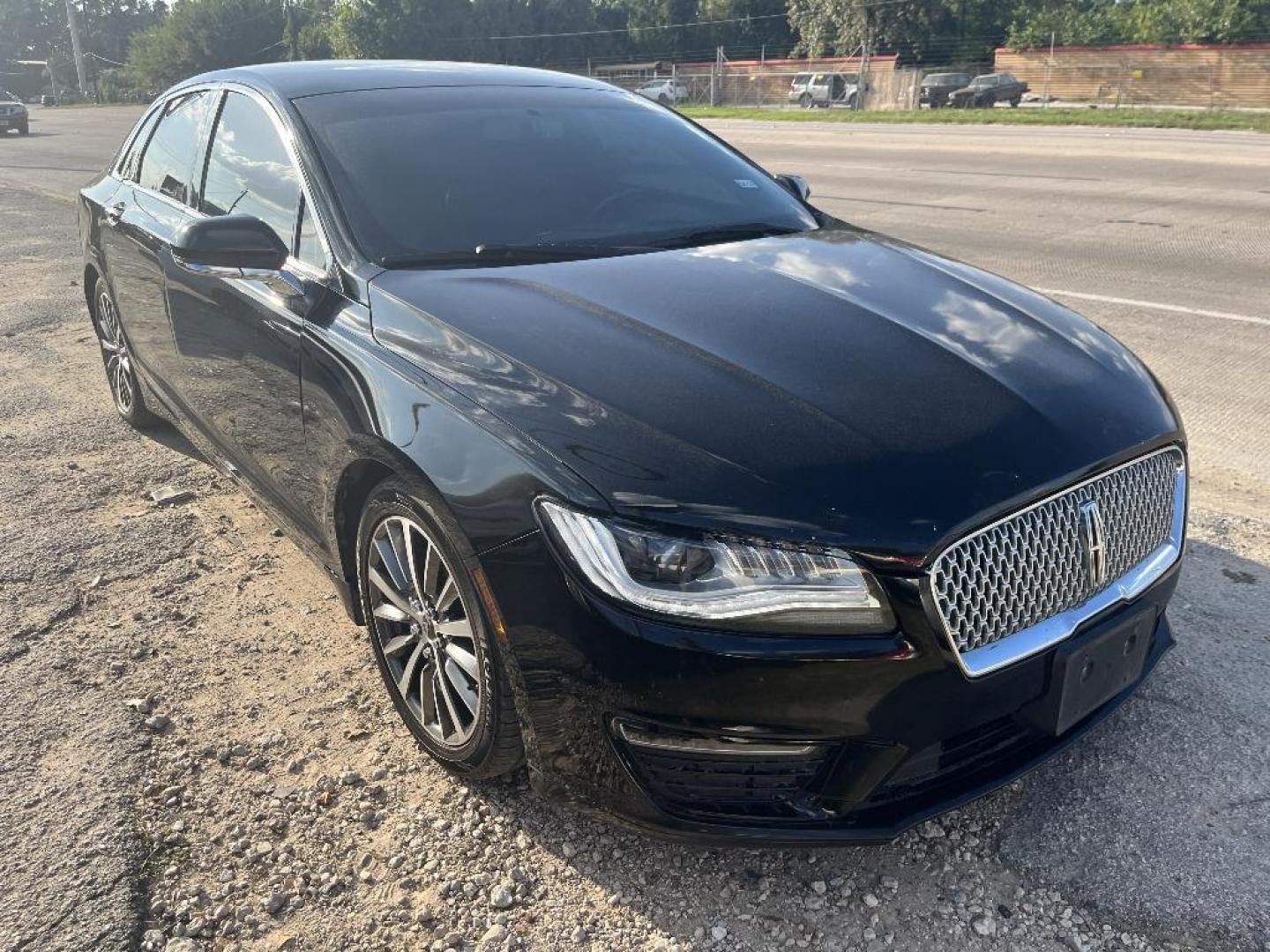 2017 BLACK LINCOLN MKZ Premier AWD (3LN6L5B97HR) with an 2.0L L4 DOHC 16V engine, AUTOMATIC transmission, located at 2303 West Mt. Houston, Houston, Texas, 77038, (281) 507-3956, 29.771597, -95.339569 - Photo#0