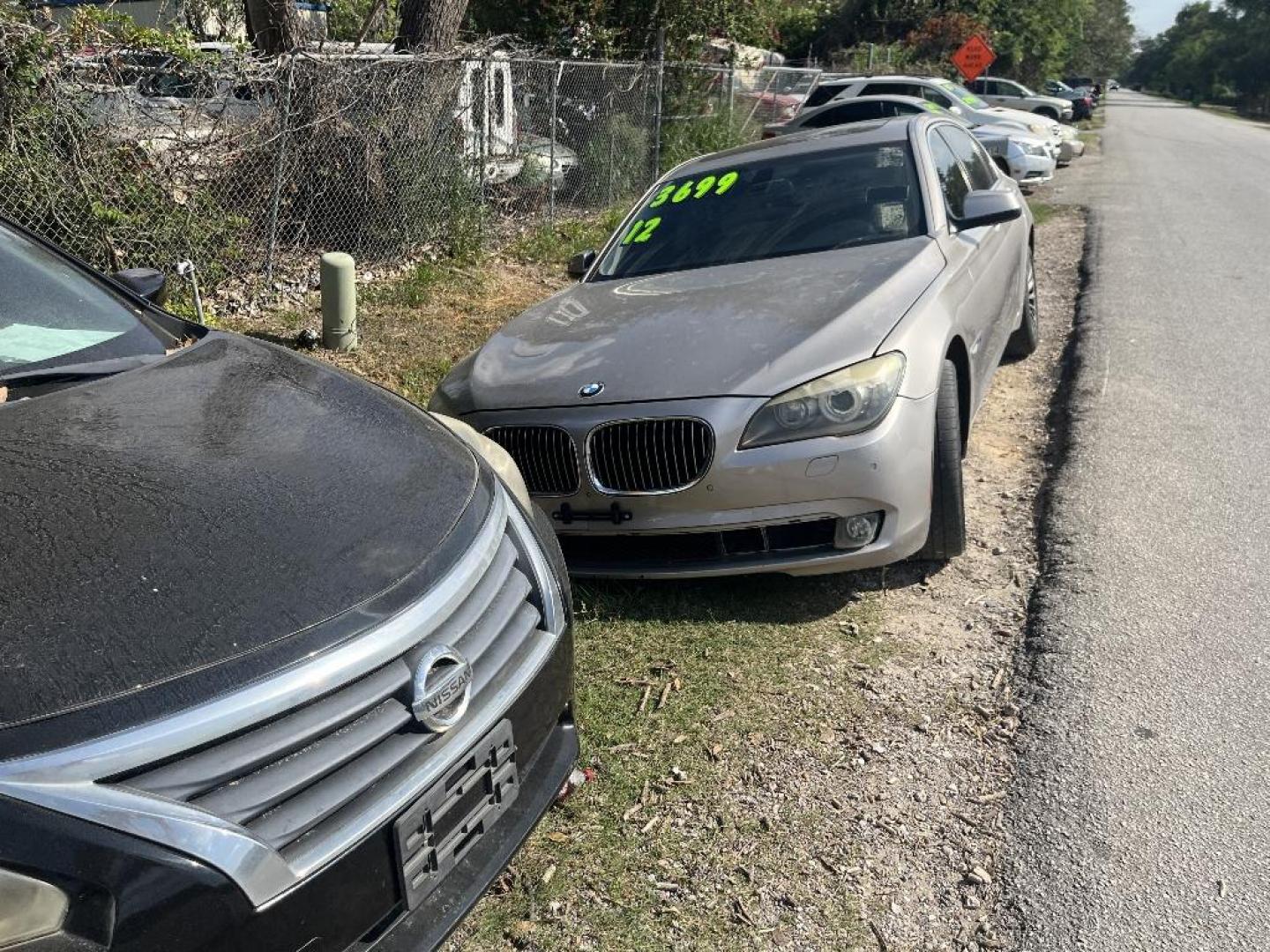 2012 BROWN BMW 7-SERIES 740iL (WBAKB4C58CC) with an 3.0L L6 DOHC 24V engine, AUTOMATIC transmission, located at 2303 West Mt. Houston, Houston, Texas, 77038, (281) 507-3956, 29.771597, -95.339569 - Photo#1