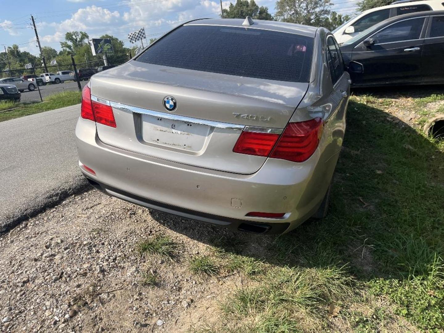 2012 BROWN BMW 7-SERIES 740iL (WBAKB4C58CC) with an 3.0L L6 DOHC 24V engine, AUTOMATIC transmission, located at 2303 West Mt. Houston, Houston, 77038, (281) 507-3956, 29.771597, -95.339569 - Photo#3