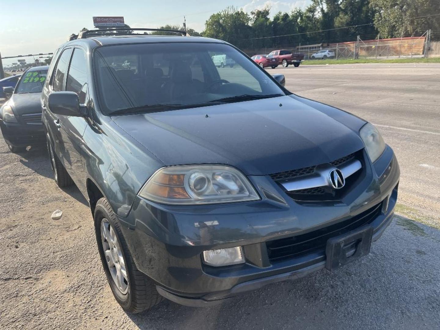 2004 BLACK ACURA MDX Touring (2HNYD186X4H) with an 3.5L V6 SOHC 24V engine, AUTOMATIC transmission, located at 2303 West Mt. Houston, Houston, Texas, 77038, (281) 507-3956, 29.771597, -95.339569 - Photo#0