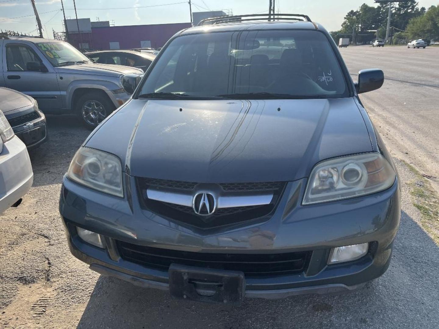 2004 BLACK ACURA MDX Touring (2HNYD186X4H) with an 3.5L V6 SOHC 24V engine, AUTOMATIC transmission, located at 2303 West Mt. Houston, Houston, Texas, 77038, (281) 507-3956, 29.771597, -95.339569 - Photo#1