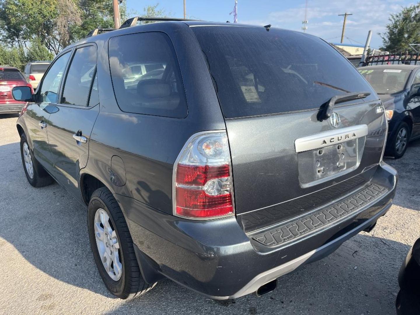 2004 BLACK ACURA MDX Touring (2HNYD186X4H) with an 3.5L V6 SOHC 24V engine, AUTOMATIC transmission, located at 2303 West Mt. Houston, Houston, Texas, 77038, (281) 507-3956, 29.771597, -95.339569 - Photo#3