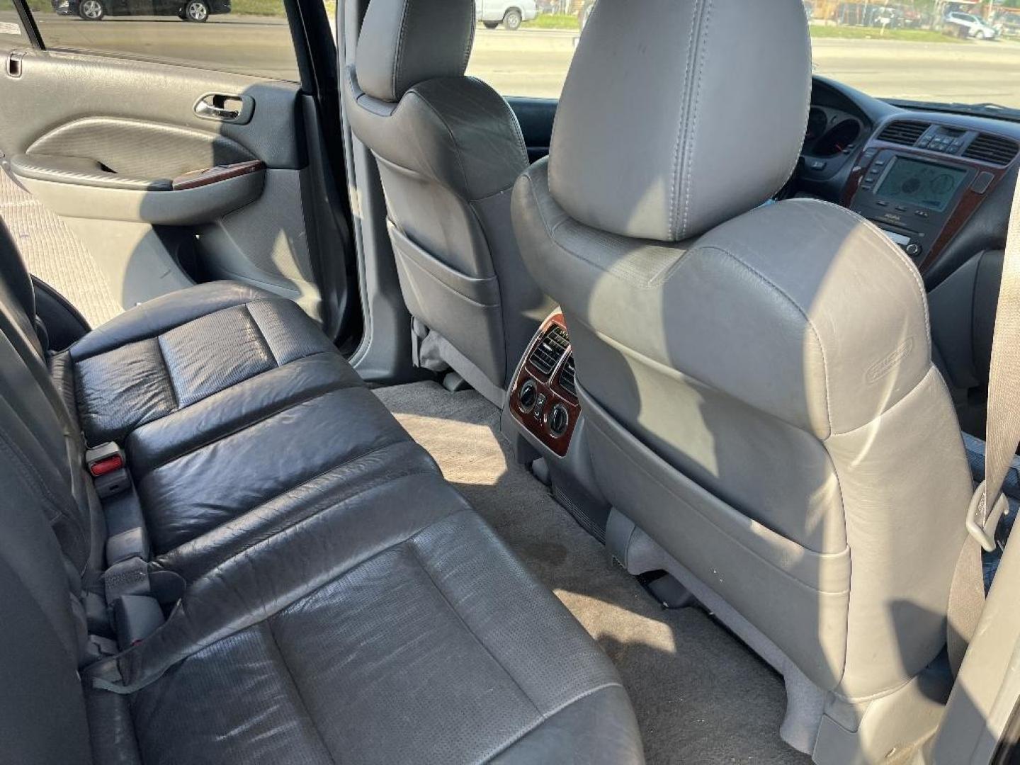 2004 BLACK ACURA MDX Touring (2HNYD186X4H) with an 3.5L V6 SOHC 24V engine, AUTOMATIC transmission, located at 2303 West Mt. Houston, Houston, Texas, 77038, (281) 507-3956, 29.771597, -95.339569 - Photo#4