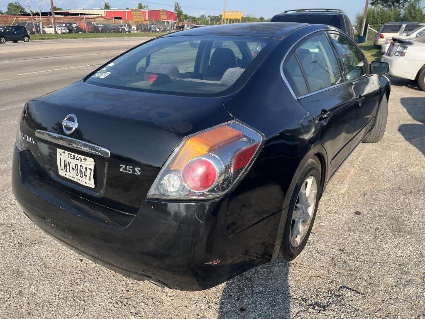 2009 BLACK NISSAN ALTIMA 2.5 (1N4AL21E59N) with an 2.5L L4 DOHC 16V engine, AUTOMATIC transmission, located at 2303 West Mt. Houston, Houston, Texas, 77038, (281) 507-3956, 29.771597, -95.339569 - Photo#4