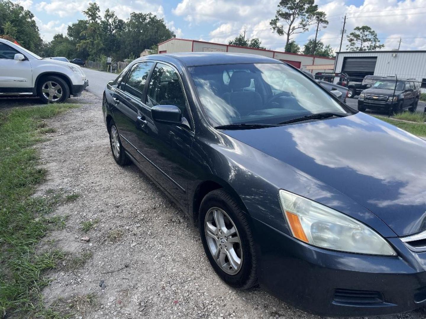 2007 BLACK HONDA ACCORD LX SE Sedan AT (1HGCM56367A) with an 2.4L L4 DOHC 16V engine, AUTOMATIC transmission, located at 2303 West Mt. Houston, Houston, Texas, 77038, (281) 507-3956, 29.771597, -95.339569 - Photo#0