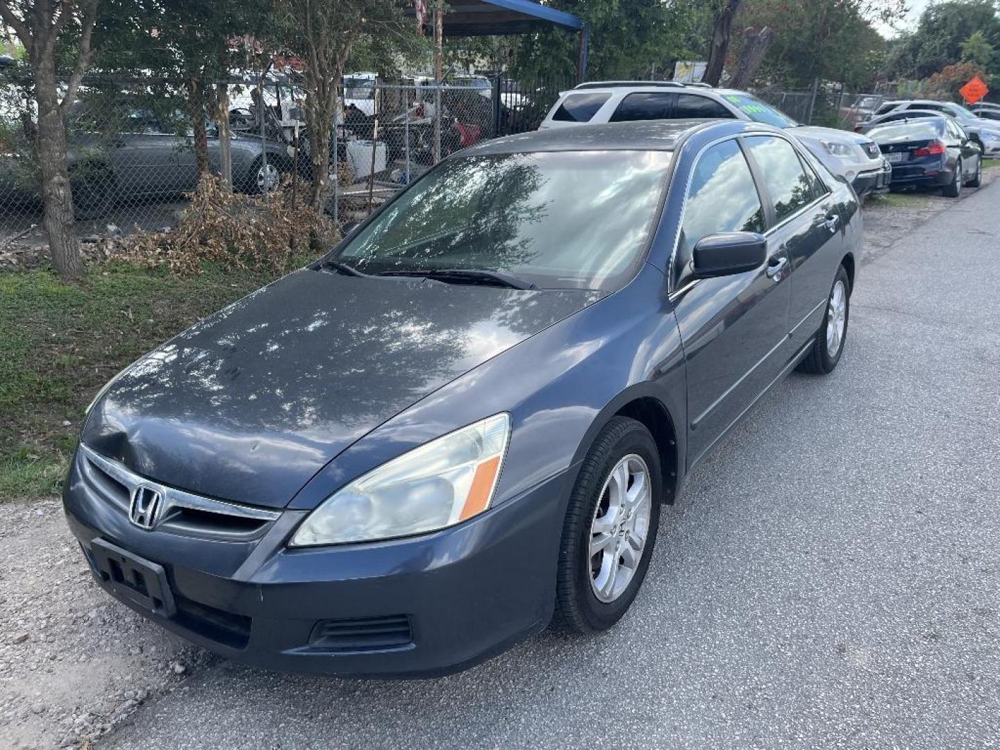 2007 BLACK HONDA ACCORD LX SE Sedan AT (1HGCM56367A) with an 2.4L L4 DOHC 16V engine, AUTOMATIC transmission, located at 2303 West Mt. Houston, Houston, Texas, 77038, (281) 507-3956, 29.771597, -95.339569 - Photo#1