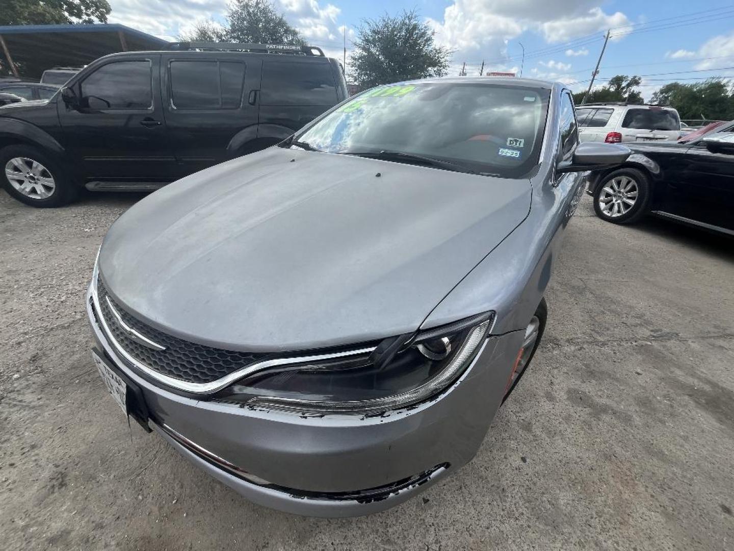 2015 SILVER CHRYSLER 200 Limited (1C3CCCAB7FN) with an 2.4L L4 DOHC 16V engine, AUTOMATIC transmission, located at 2303 West Mt. Houston, Houston, Texas, 77038, (281) 507-3956, 29.771597, -95.339569 - Photo#0