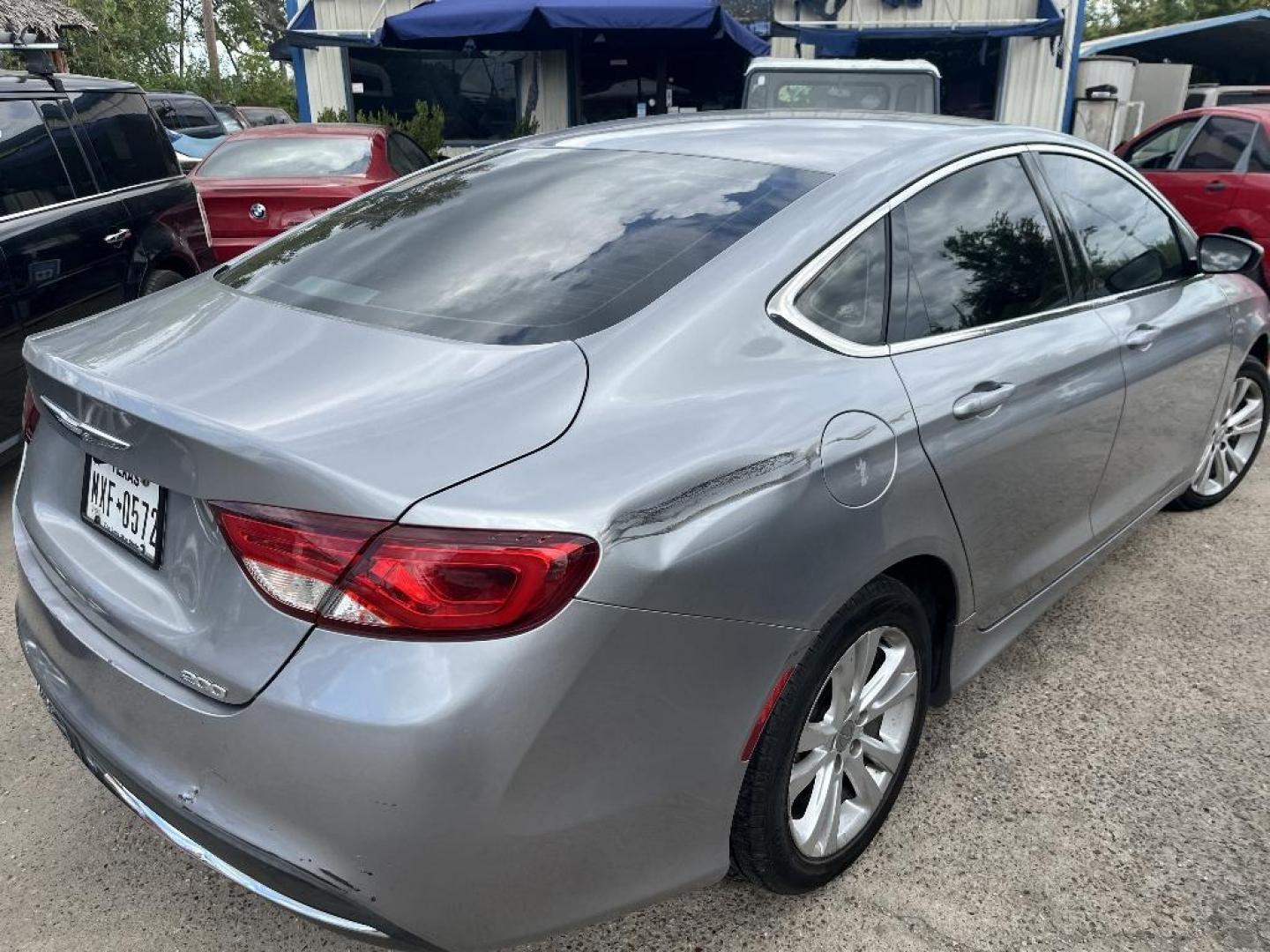 2015 SILVER CHRYSLER 200 Limited (1C3CCCAB7FN) with an 2.4L L4 DOHC 16V engine, AUTOMATIC transmission, located at 2303 West Mt. Houston, Houston, Texas, 77038, (281) 507-3956, 29.771597, -95.339569 - Photo#4