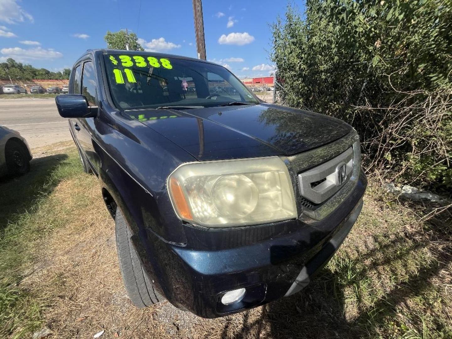 2011 BLUE HONDA PILOT EX-L 2WD 5-Spd AT (5FNYF3H56BB) with an 3.5L V6 SOHC 24V engine, AUTOMATIC transmission, located at 2303 West Mt. Houston, Houston, Texas, 77038, (281) 507-3956, 29.771597, -95.339569 - Photo#0