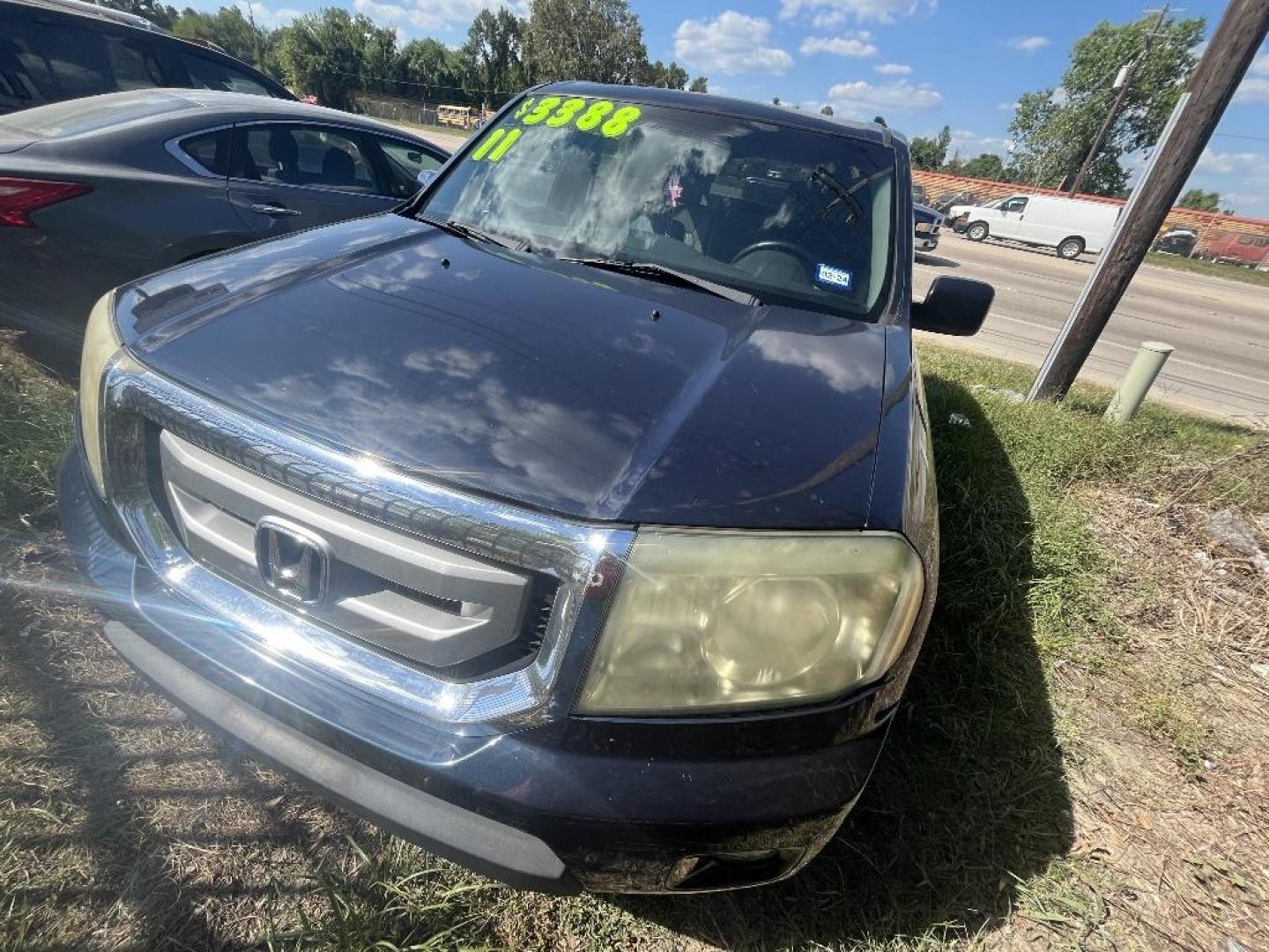 2011 BLUE HONDA PILOT EX-L 2WD 5-Spd AT (5FNYF3H56BB) with an 3.5L V6 SOHC 24V engine, AUTOMATIC transmission, located at 2303 West Mt. Houston, Houston, Texas, 77038, (281) 507-3956, 29.771597, -95.339569 - Photo#10