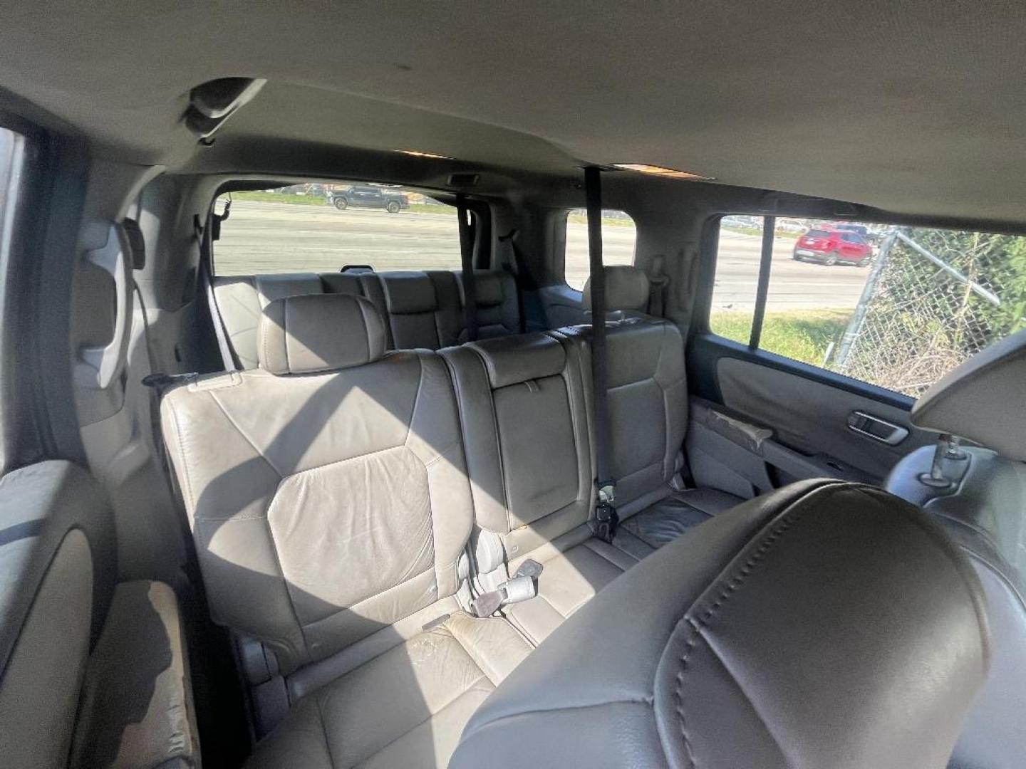 2011 BLUE HONDA PILOT EX-L 2WD 5-Spd AT (5FNYF3H56BB) with an 3.5L V6 SOHC 24V engine, AUTOMATIC transmission, located at 2303 West Mt. Houston, Houston, Texas, 77038, (281) 507-3956, 29.771597, -95.339569 - Photo#5