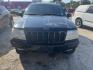 2000 BLACK JEEP GRAND CHEROKEE Limited 4WD (1J4GW58N0YC) with an 4.7L V8 SOHC 16V engine, AUTOMATIC transmission, located at 2303 West Mt. Houston, Houston, Texas, 77038, (281) 507-3956, 29.771597, -95.339569 - Photo#3