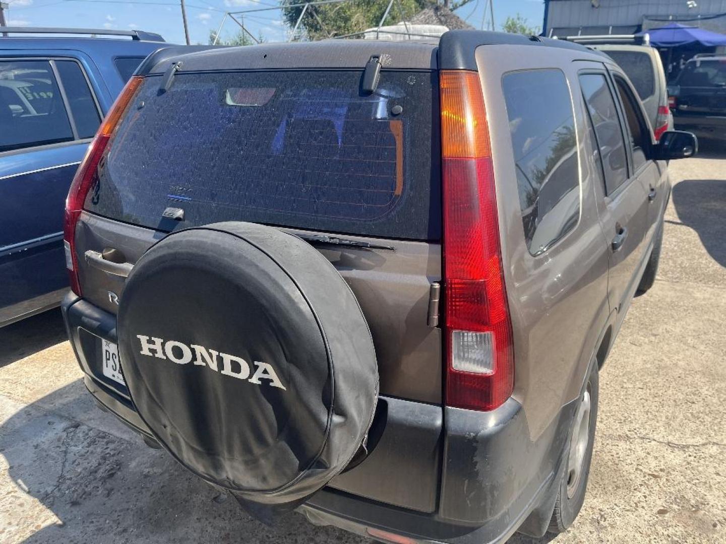 2002 BROWN HONDA CR-V LX 2WD (JHLRD68472C) with an 2.4L L4 DOHC 16V engine, AUTOMATIC transmission, located at 2303 West Mt. Houston, Houston, Texas, 77038, (281) 507-3956, 29.771597, -95.339569 - Photo#1