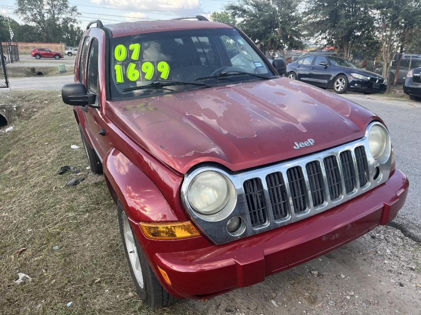 2007 RED JEEP LIBERTY Limited 2WD (1J4GK58K17W) with an 3.7L V6 SOHC 12V engine, AUTOMATIC transmission, located at 2303 West Mt. Houston, Houston, Texas, 77038, (281) 507-3956, 29.771597, -95.339569 - Photo#0