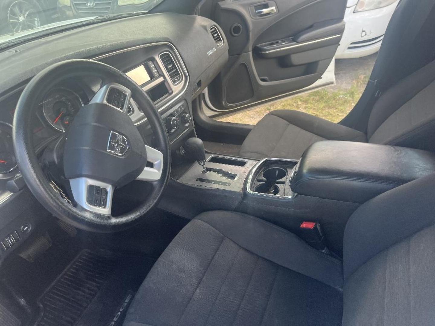 2014 WHITE DODGE CHARGER SE (2C3CDXBGXEH) with an 3.6L V6 DOHC 24V engine, AUTOMATIC transmission, located at 2303 West Mt. Houston, Houston, Texas, 77038, (281) 507-3956, 29.771597, -95.339569 - Photo#2