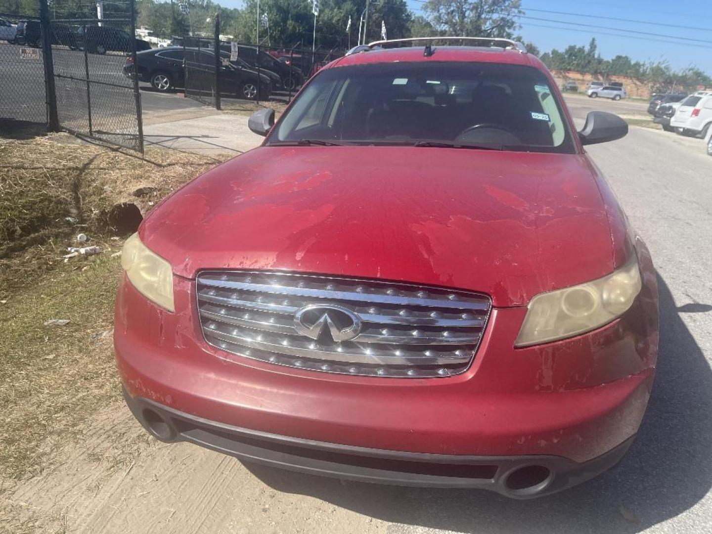 2004 RED INFINITI FX FX35 AWD (JNRAS08W74X) with an 3.5L V6 DOHC 32V engine, AUTOMATIC transmission, located at 2303 West Mt. Houston, Houston, Texas, 77038, (281) 507-3956, 29.771597, -95.339569 - Photo#0