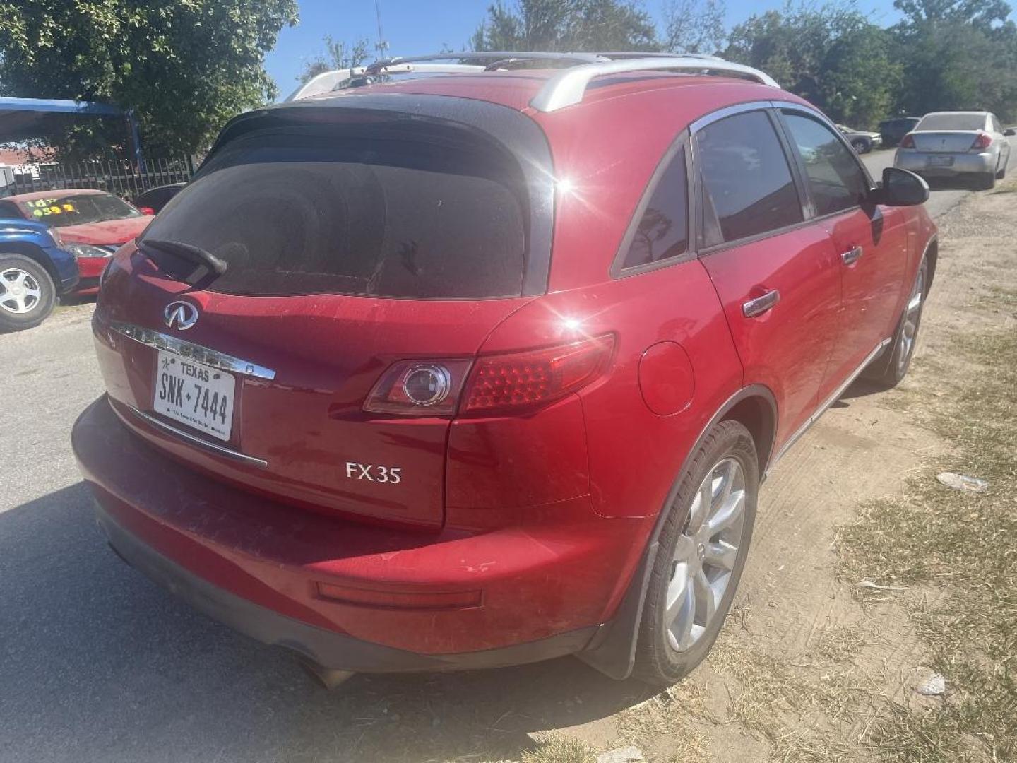 2004 RED INFINITI FX FX35 AWD (JNRAS08W74X) with an 3.5L V6 DOHC 32V engine, AUTOMATIC transmission, located at 2303 West Mt. Houston, Houston, Texas, 77038, (281) 507-3956, 29.771597, -95.339569 - Photo#1