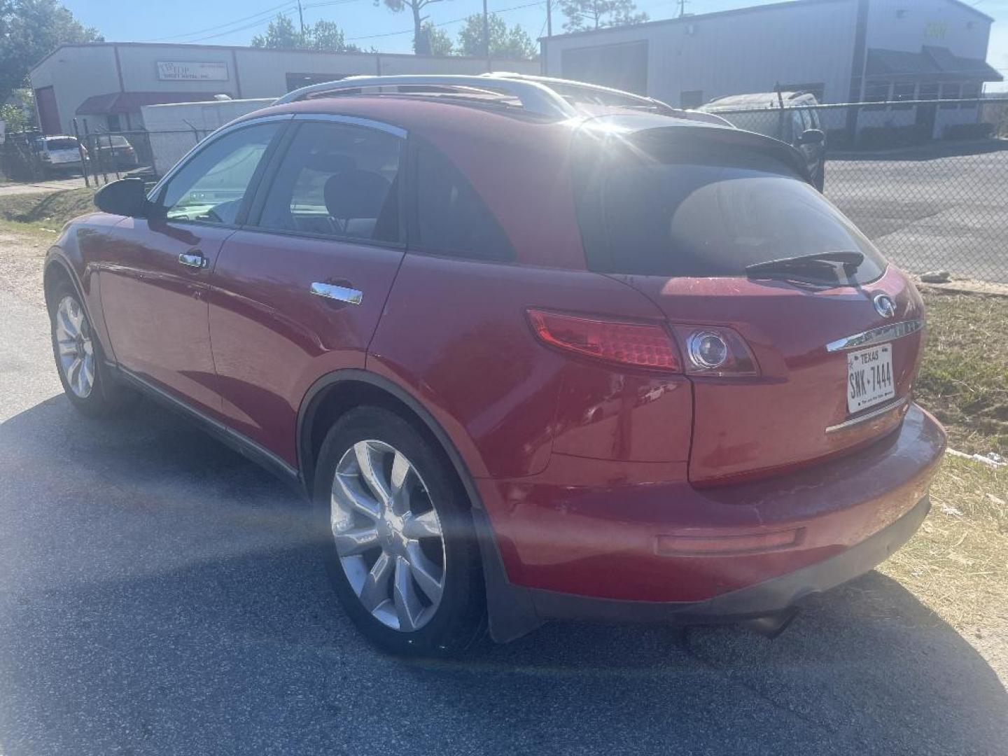 2004 RED INFINITI FX FX35 AWD (JNRAS08W74X) with an 3.5L V6 DOHC 32V engine, AUTOMATIC transmission, located at 2303 West Mt. Houston, Houston, Texas, 77038, (281) 507-3956, 29.771597, -95.339569 - Photo#2