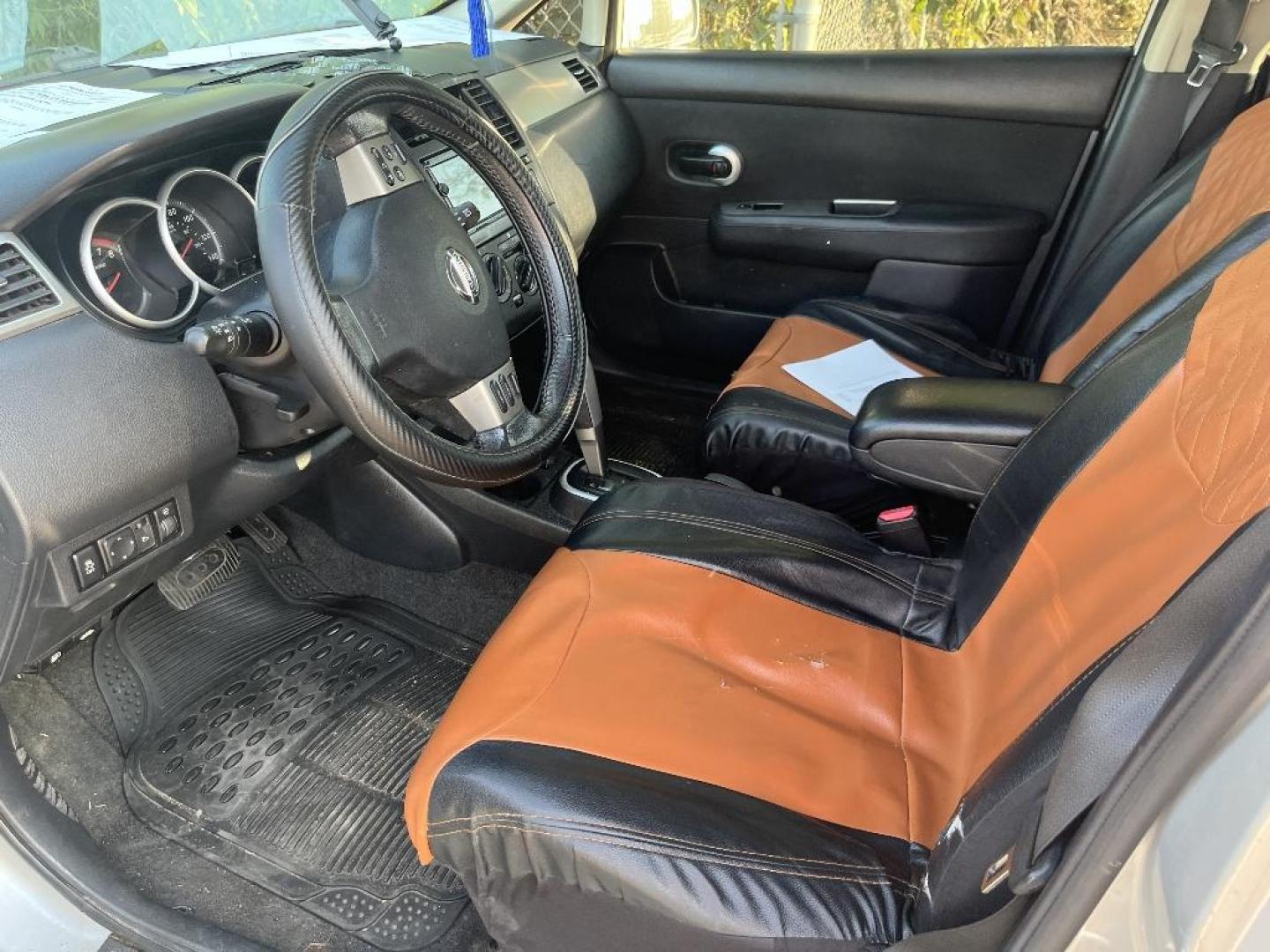 2012 SILVER NISSAN VERSA 1.8 SL Hatchback (3N1BC1CP1CK) with an 1.8L L4 DOHC 16V engine, AUTOMATIC transmission, located at 2303 West Mt. Houston, Houston, Texas, 77038, (281) 507-3956, 29.771597, -95.339569 - Photo#3